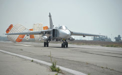 *Бомбардировщик Су-24 садится на авиабазе "Хмеймим" (Латакия), Сирия