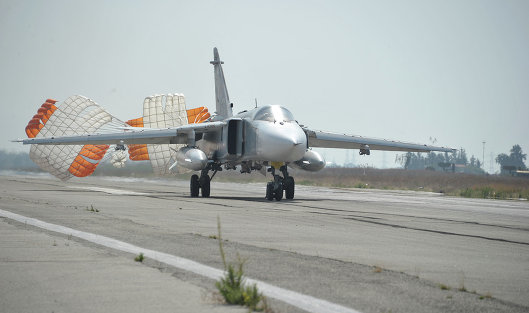 *Бомбардировщик Су-24 садится на авиабазе "Хмеймим" (Латакия), Сирия