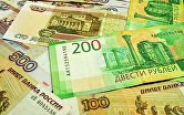 Банкноты номиналом 100, 200 и 500 рублей