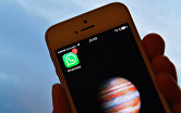 " Иконка мессенджера WhatsApp на экране смартфона