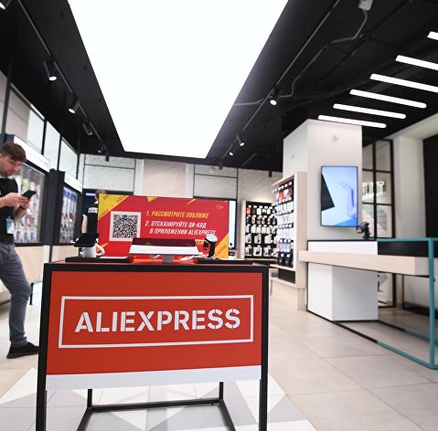 Брендированные витрины с товарами AliExpress в салонах Tele2