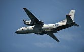 Военно-транспортный самолёт Ан-26 ВМФ России на генеральной репетиции парада в честь Дня Военно-морского флота в Севастополе