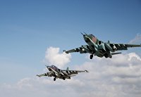 Российские штурмовики Су-25 взлетают с авиабазы "Хмеймим"в Сирии