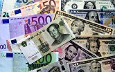 Банкноты евро, долларов США и китайских юаней