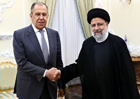 Министр иностранных дел Российской Федерации Сергей Лавров на встрече с президентом Ирана Эбрахимом Раиси в Тегеране