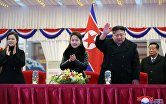 Ким Чен Ын с дочерью на праздновании Нового года